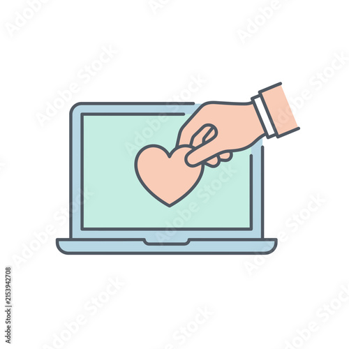 Hand placing heart icon on laptop screen interface