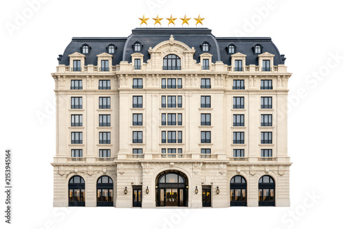 Elegant historic hotel facade, classic European architecture with mansard roof and arched entrance, isolated on white