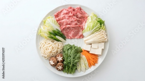 Top Down Flat Lay Japanese Shabu Shabu Ingredient Platter Thinly Sliced Beef Napa Cabbage Tofu


