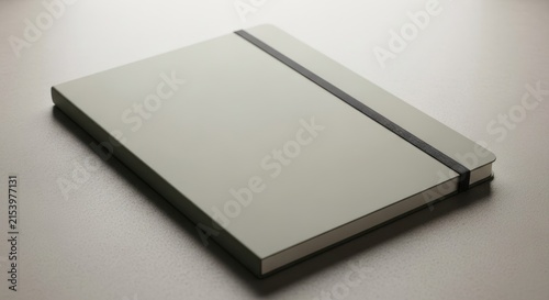 Naklejka Clean notebook on a surface with soft lighting and copy space available