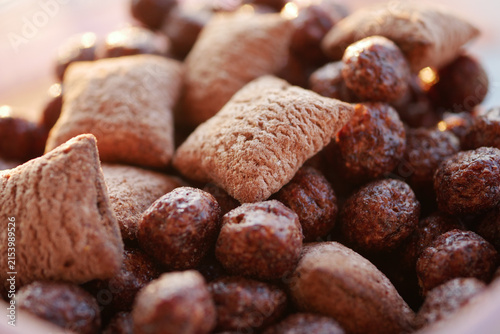 Quadro su tela Chocolate cereals in a bowl filled with different shapes
