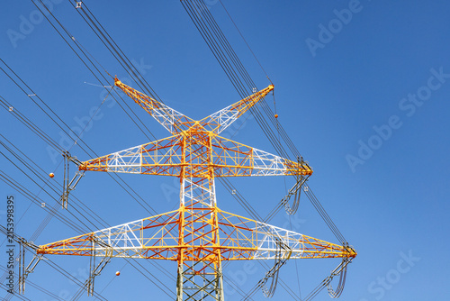 Cuadro en lienzo electricity pylon near the airport painted in red and white at the top to indica