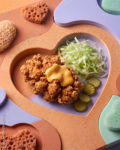 Creative stylist chicken burger food photography concept with vibrant colors and modern composition