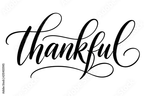 Elegant calligraphy script of the word thankful isolated on a white background for holiday greeting cards