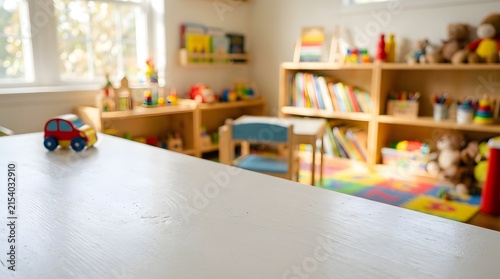 Toy car on white table in a blurred bright sunny
