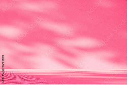 Wall interior background, studio and backdrops show products.with shadow from window color pink background for text insertion and presentation interior decoration	
