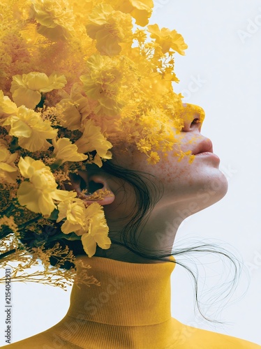 Woman's profile adorned with vibrant yellow flowers and a matching turtleneck