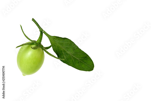 Fresh green tomato with a  green leaf on a white background
