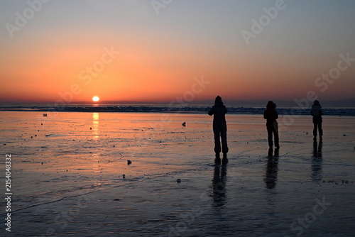 Sunrise on Lake Baikal in winter. Olkhon Gate Strait, Eastern Siberia, Russia