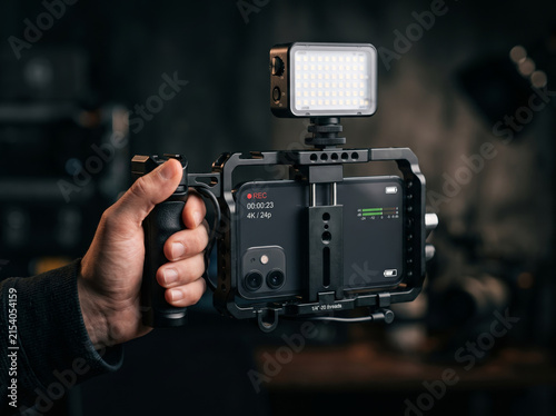 Hand Holding Portable Mobile Camera Rig with LED Light and Microphone Attached