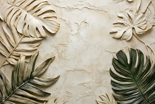 Textured tropical leaves on a neutral background with elegant natural shapes and soft shadows.