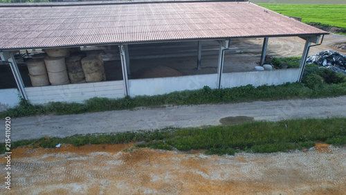 Konstfotografi Agricultural barn storing hay bales and feed in the Po Valley, Italy