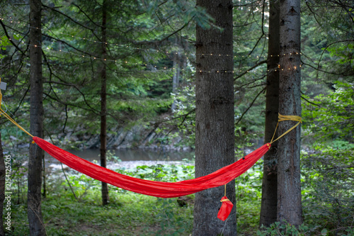 Outdoor Adventure Campsite with Hammock in the Forest