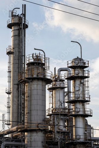 Industrial Oil Refinery Processing Towers and Pipelines at Petrochemical Plant