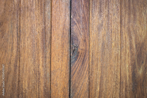 Natural brown wooden planks texture background with wood knot.