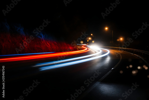 Futuristic tunnel interior with glowing blue and red light streaks depicts a sci fi transportation corridor scifi science fiction cyberpunk neon light streaks light trails relight bluelight
