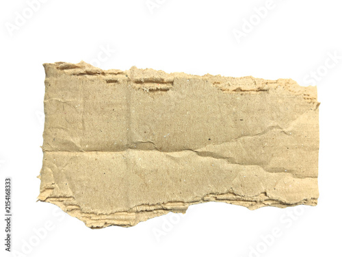 Torn piece of brown corrugated cardboard isolated on white background