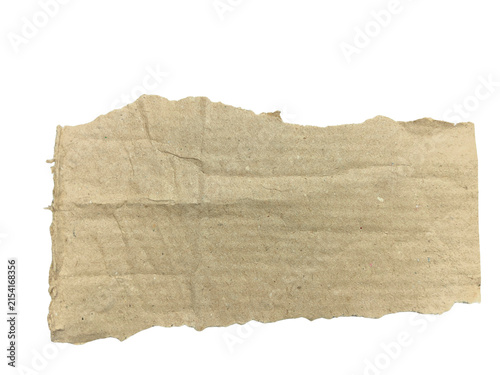 Torn piece of brown corrugated cardboard isolated on white background