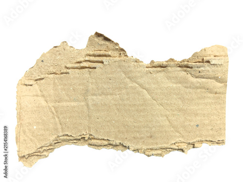 Torn piece of brown corrugated cardboard isolated on white background