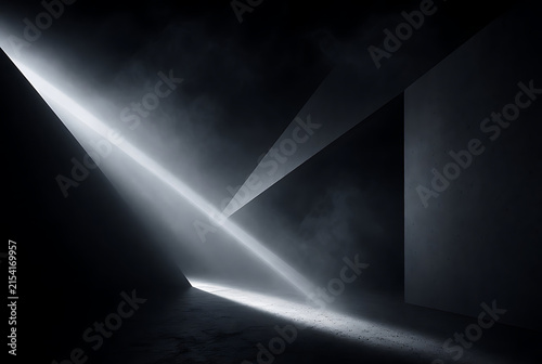 Sunbeams illuminate a concrete wall creating dramatic shadows and a moody atmospheric setting architecture beams construction darkness exposure geometric gray illumination interior light lighting