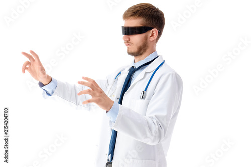 Male doctor in AR glasses u...