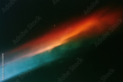 The Aurora Borealis Rainbow Across a Dark Night Sky with Ethereal Light