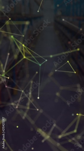 Animation of yellow shapes moving over warehouse
