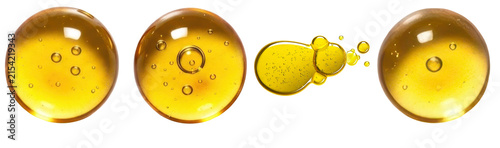 Bild auf Leinwand a stunning 3d render of vibrant golden yellow oil drops with delicate bubbles, isolated on a sleek transparent background, perfect for beauty product concepts