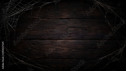 Spooky Dark Wooden Background with Spider Webs