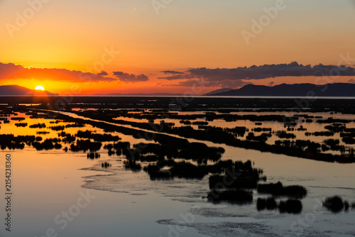 Peru, Titicaca lake, sunrise above the lake