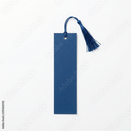 Blue bookmark with a tassel on a white background  