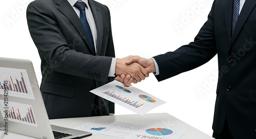 Professional Handshake Over Business Documents And Charts.