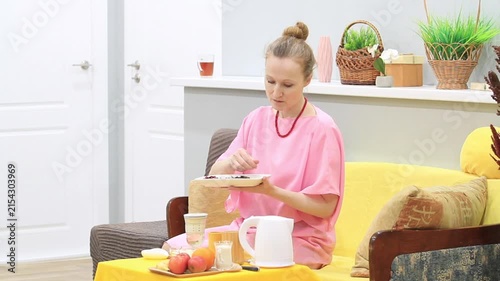 woman trying ku qiao buckwheat tea for brewing herbal tea, side view
