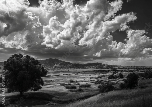 Dramatic Black and White Landscape with Clouds and Mountains.