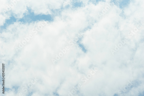 Fotografie fluffy white clouds against blue sky background concept of nature, weather, atmo