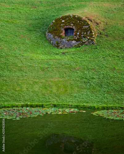 Mossy stone structure of the historic bunker creates a hidden shelter