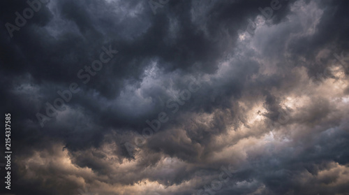 Ominous dark storm clouds cover the entire sky, creating a dramatic and foreboding natural backdrop.