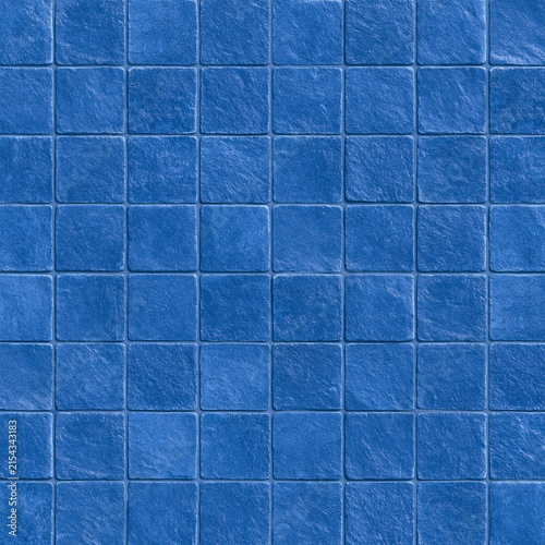 a horizontal wide image of blue square floor tiles, matte surface without any reflections