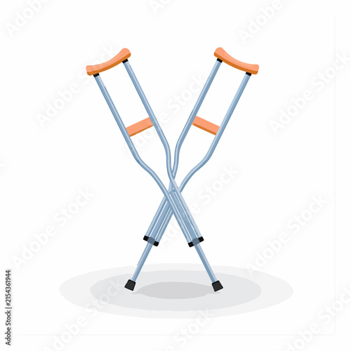 A pair of crossed medical underarm crutches for orthopedic recovery and mobility assistance
