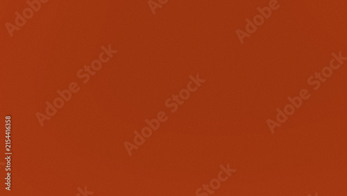 A solid deep burnt orange background texture with a subtle grainy surface pattern suitable for creative design projects and digital backdrops