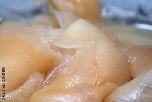 Konstfotografi Close-up view of fresh pickled ginger slices in a serving bowl
