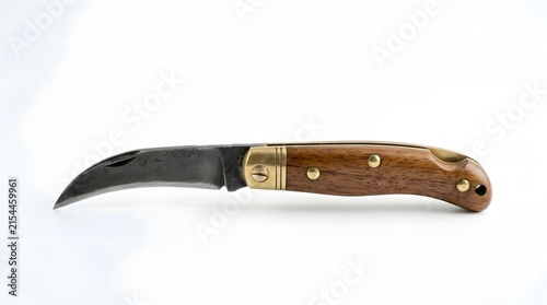 Hawkbill pruning knife with a wooden handle and brass accents