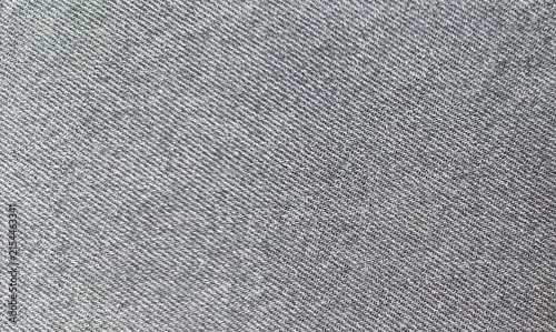 Obraz na plátně Close up of gray denim with a diagonal twill weave and faded, worn surface