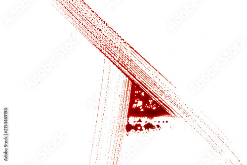 Abstract dark grunge background featuring textured red diagonal lines intersecting on a black canvas. Halloween concept