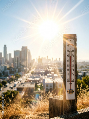 Summer heat background - Thermometer sky and sun rays
