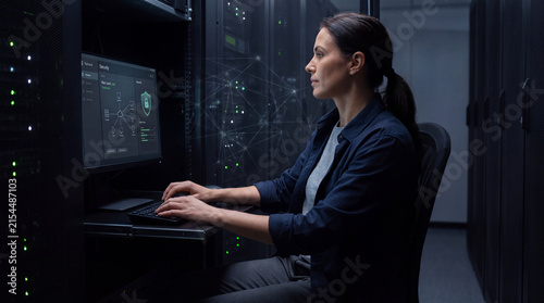 Businessman reviewing AI operations performance charts on a holographic dashboard