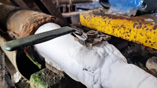 Extreme frost accumulation on industrial ball valve and steel pipeline system for liquid gas processing