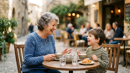 heartwarming scene of an elderly woman and young boy sharing joyful conversation at outdoor cafe on a lively city street
