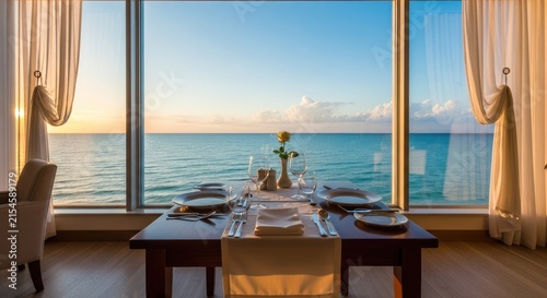 Elegant dining table overlooking tropical ocean sunset.