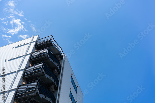 Fire Escape Stairs on Modern Apartment Building Facade for Real Estate Property Management and Building Safety Concept, Low Angle Perspective Photo with Copyspace